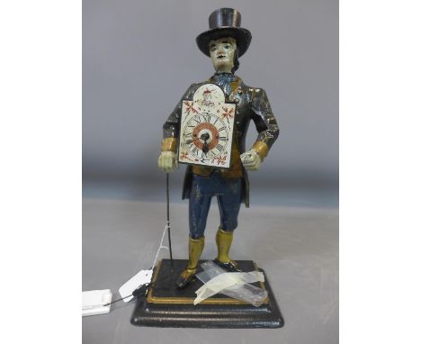 A 19th century enamel clock in the form of a gentleman, the broken arched dial with Roman numerals, on stepped rectangular ba
