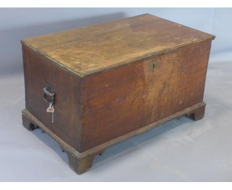 An early 20th century mahogany trunk, on bracket feet, H.50 W.90 D.53cm 