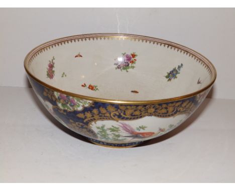 A 19thC Worcester style blue scale ground fruit bowl decorated with an exotic bird, 9.5” diameter.