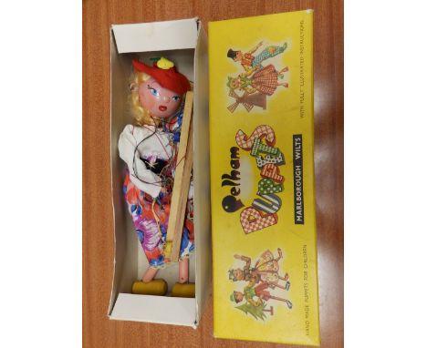 A boxed Pelham puppet – Mitzi.