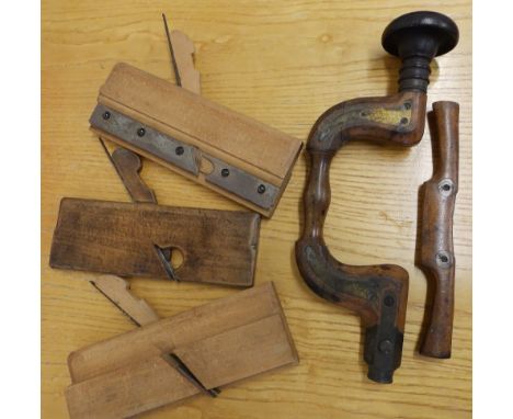 A small collection of old woodworking tools.