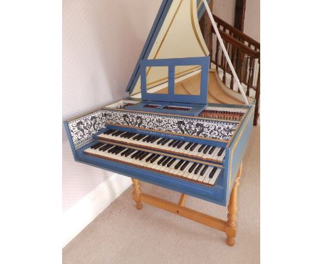 A double manual harpsichord in blue painted wood case by Malcolm Greenhalgh, London, dated 1986, on trestle base, Length 87”,