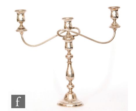 A hallmarked silver three light candelabra, circular stepped base below knopped column and circular sconces, height 38cm, Bir