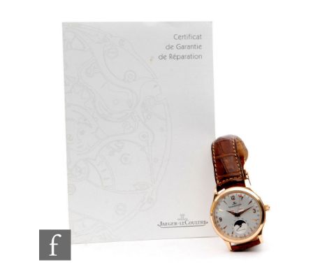 A gentleman's 18ct Jaeger-LeCoultre 18ct master moon wrist watch with batons and Arabic numerals, rising moon, day and month 
