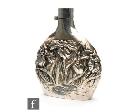 A Japanese Mejii period silver scent bottle of compressed form decorated with iris to a riverbank, height 11cm, Sanju Saku, Y