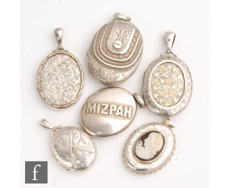 Two Victorian hallmarked silver oval lockets each with part foliate decoration, with four other similar white metal lockets t