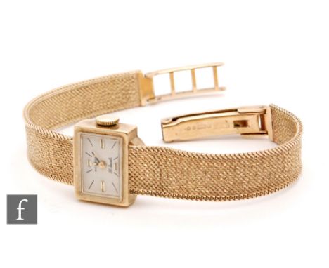 A lady's 9ct Rotary wrist watch, batons to a rectangular silvered dial and integral mesh bracelet, total weight 17g, London 1