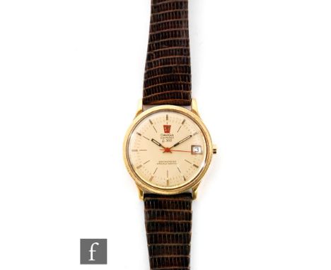 A 1970s 18ct gentleman's Omega electronic f300 chronometer wrist watch, circular satin brushed gold dial with baton markers, 