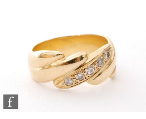 A modern 18ct hallmarked diamond five stone ring, diagonally sunk set stones to a ribbed band, weight 7.3g, ring size L. 