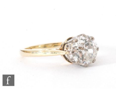 An 18ct diamond solitaire ring, illusion set old cut stones, weight approximately 1.00ct, colour O/P clarity VS1, to knife ed