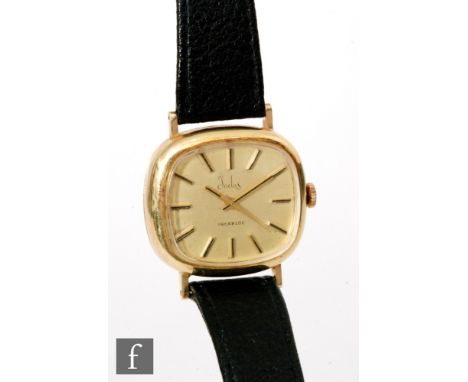 A 14ct Gentleman's Indus manual wind wrist watch, gilt batons to a cushioned rectangular dial, all to a black leather strap. 