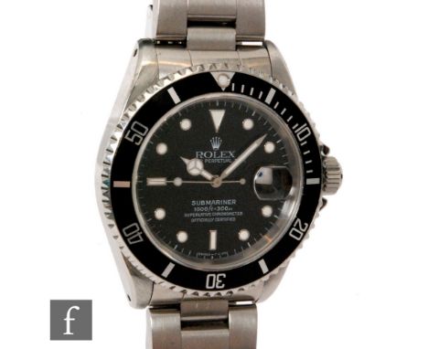 A gentleman's stainless steel Rolex submariner 16610 wrist watch with batons and date facility to a black dial, 1000ft = 300m