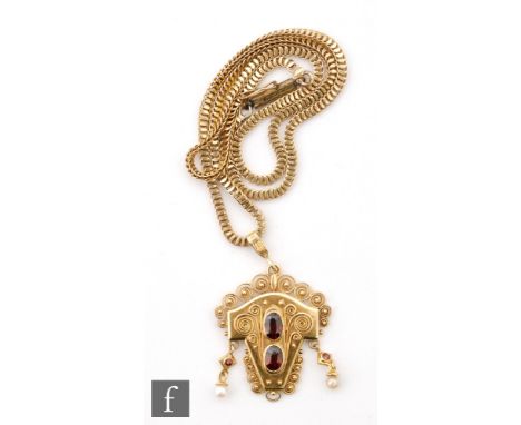 A 14ct Edwardian style pendant set with two garnets and seed pearl drop, weight 6g, suspended from an unmarked gilt chain. 