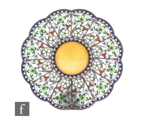 A Norwegian silver small circular plique a jour pedestal dish decorated with flower heads around a yellow enamel central well