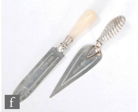 A hallmarked silver bookmark modelled as a trowel, with a similar mother of pearl handled example, Birmingham 1887 and 1903 r