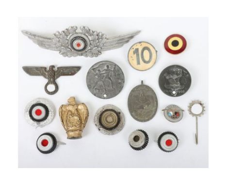 Third Riech German  Badges: Luftwaffe hat cockade, political cap eagle, cockades, West Wall medal, DAF pin, day badges and Kr