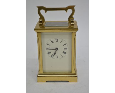 A lacquered brass carriage clock, 