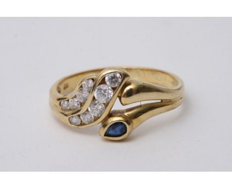 A 14ct gold diamond and sapphire ring, approx 3.1g and size N-O.