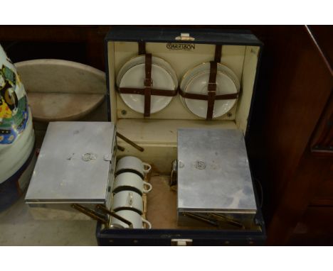 A Vintage Garrison picnic set inset with metal containers,cups and saucers