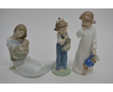 A collection of 5 Nao figures in mint condition, no boxes. Woman with Child height: 7 inches (approx) Boy with Puppy height: 