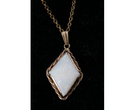 A 9ct gold pendant set with a diamond shaped opal, approx 5.3g.