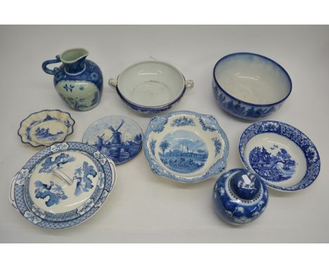 A collection of various blue and white ceramic items including plates, vases etc.