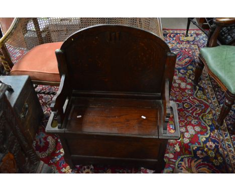 An oak bench hall seat