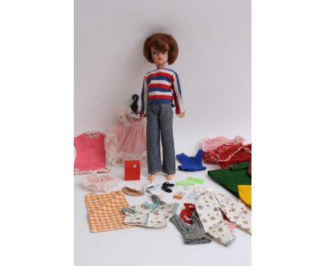 An early unboxed Sindy Doll complete with clothing and accessories including record player