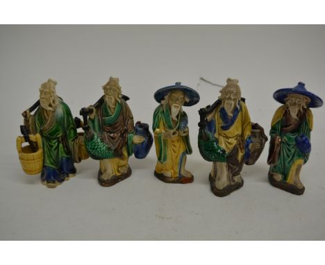 A collection of 20th century decorative ceramic figures including a Royal Worcester Freida Doughty figure 'The Parakeet 3087'