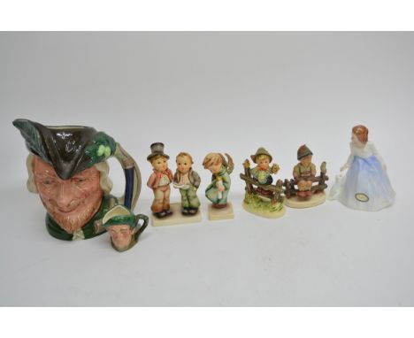 A collection of Royal Doulton character jugs of various sizes including a boxed 'North Staffordshire Drummer Boy'  Rupert 'Al