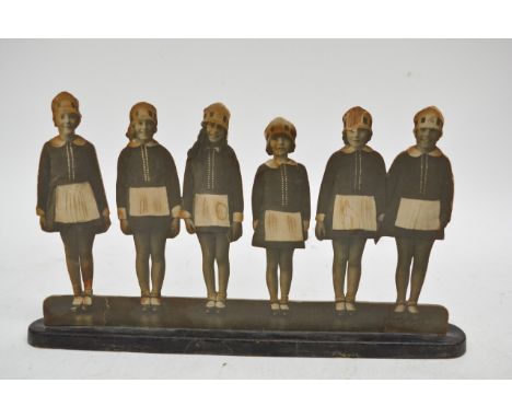 An unusual vintage carved wood and paper advertising board in the form of five young waitress, 28x16cm 