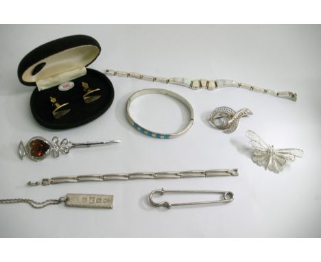 A bag containing a quantity of silver jewellery various including an opal doublet bracelet 