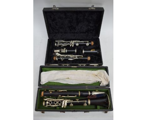 A cased Martin Clarinet and a Regent Clarinet