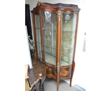 A fine quality 19th century French display cabinet with curved front, painted portrait panels and gilt mounts