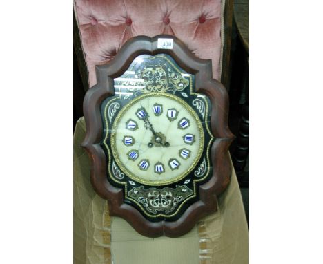 A continental late 19th century wall clock with an alabaster dial and applied brass. 