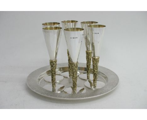 A fine quality set of six modern design silver and parcel gilt champagne flutes designed by George Grant MacDonald, dated 197