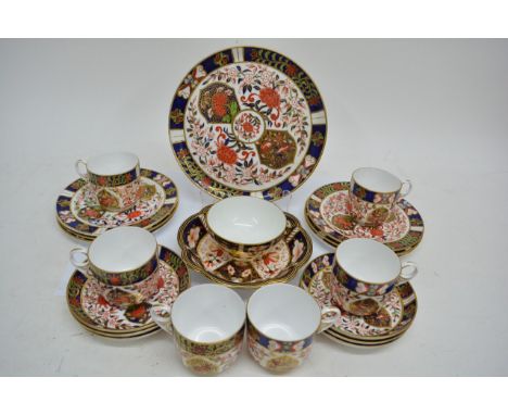 A royal crown derby cups and saucers and side plates