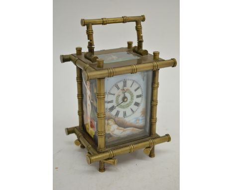 A brass cased carriage clock with simulated bamboo and exotic enamel panels 