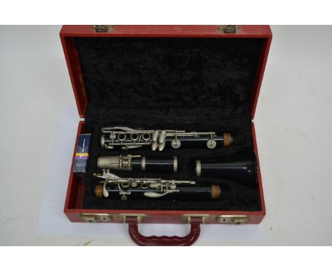 A cased vintage clarinet 'Romilly Sonata' by Gudall Carte & Co Ltd London.