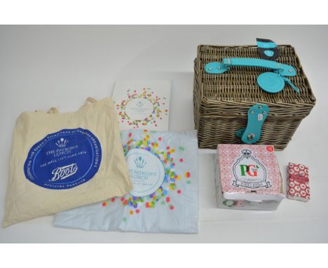 An Elizabeth II - The Patrons Lunch box hamper with brochure, cup and saucer hamper with contents (except food)  