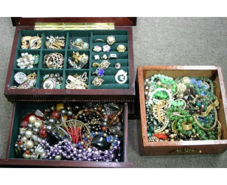 Two boxes of vintage costume jewellery, including Murano glass beads and Art Deco earrings