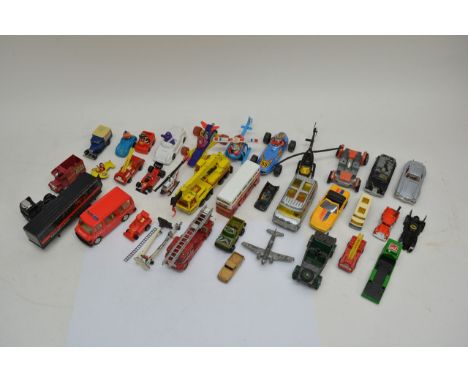 An unboxed Magic Mike robot, a boxed Rogun by Arcoo, and a collection of unboxed model vehicles and other toys including Fish