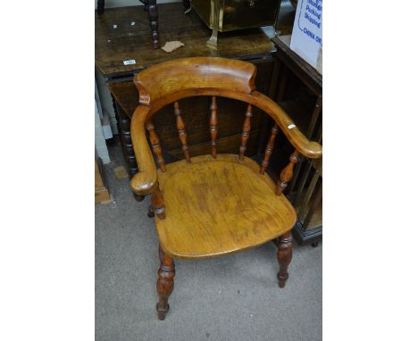 An elm stick back chair with open arms, a carved stool and an Indian panel