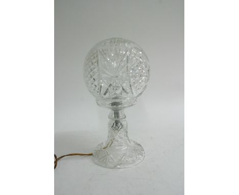 A cut glass side lamp with detachable shade