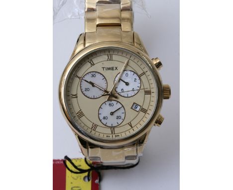 Brand new boxed ladies TIMEX four-face stainless steel watch.