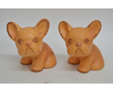 A pair of Melba ware dog ornaments.