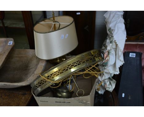 A large brass ceiling light fitting plus a similar lamp and strip light