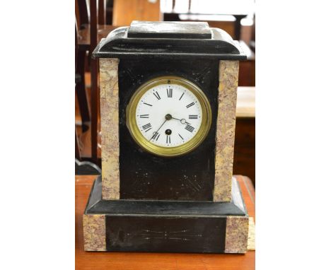 A Victorian slate and marble clock.