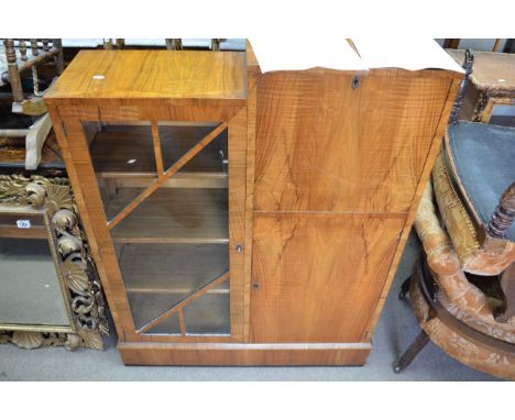 An Art Deco walnut bureau cabinet, with a well fitted interior, steps top display cabinet and cupboard. 