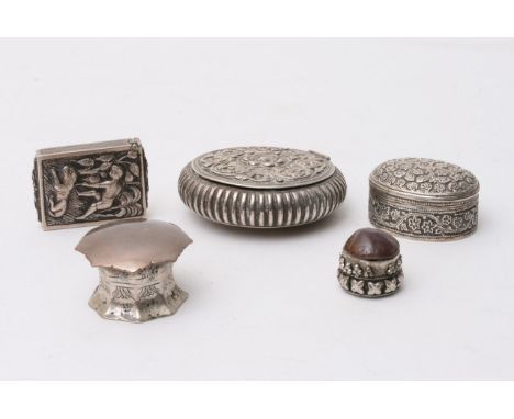 A collection of Indian white metal patch, snuff and vesta boxes